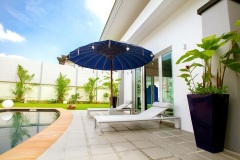 Relaxation-by-the-poolside-with-comfortable-loungers-at-Villa-Piti-in-Ao-Nang