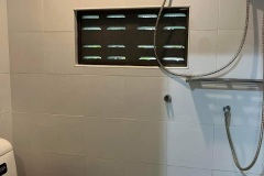 Modern-bathroom-with-a-hot-water-heater-for-a-soothing-and-comfortable-shower-experience