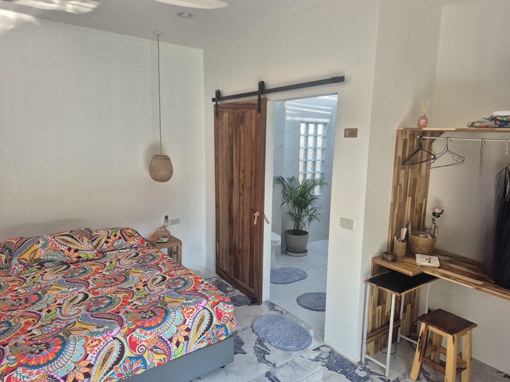 master bedroom with private bathroom